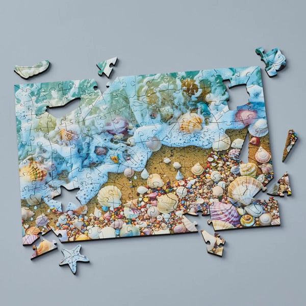Wooden jigsaw puzzle Shells by the Sea – colorful marine-themed puzzle fully assembled